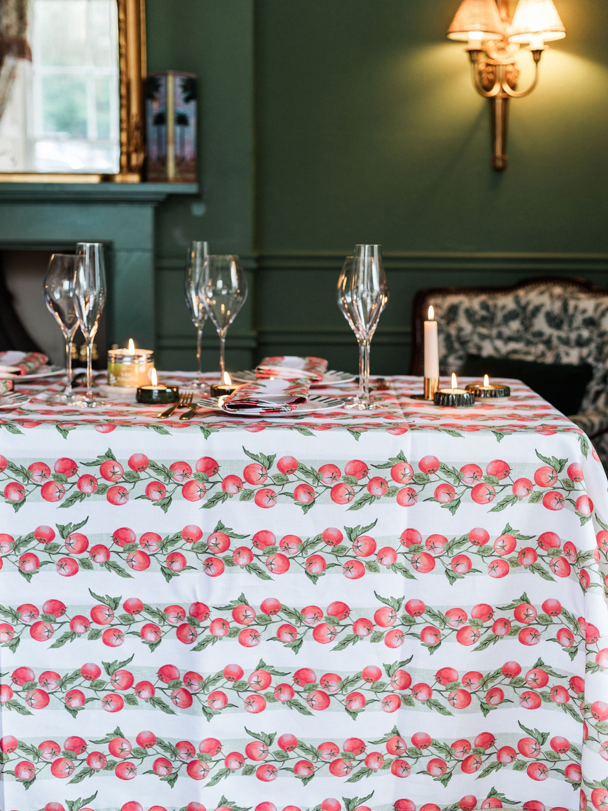 Vine tomato patterned tablecloth from Avalon Home UK, bright spring and summer design, perfect for outdoor dining and gatherings.