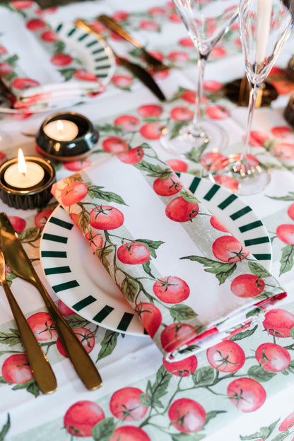 Pair of Avalon Home UK Vine Tomato napkins featuring vibrant tomato vine print for elegant table setting.