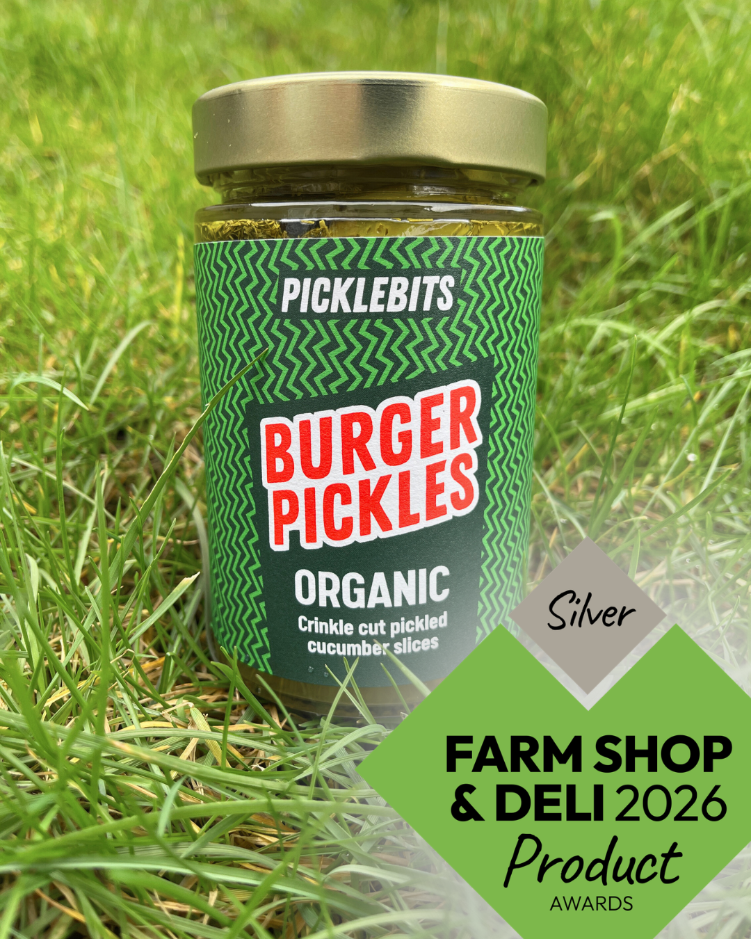 Organic Dill & Garlic Burger Pickles from PICKLEBITS, crinkle-cut pickled cucumber slices, award-winning and naturally flavorful.