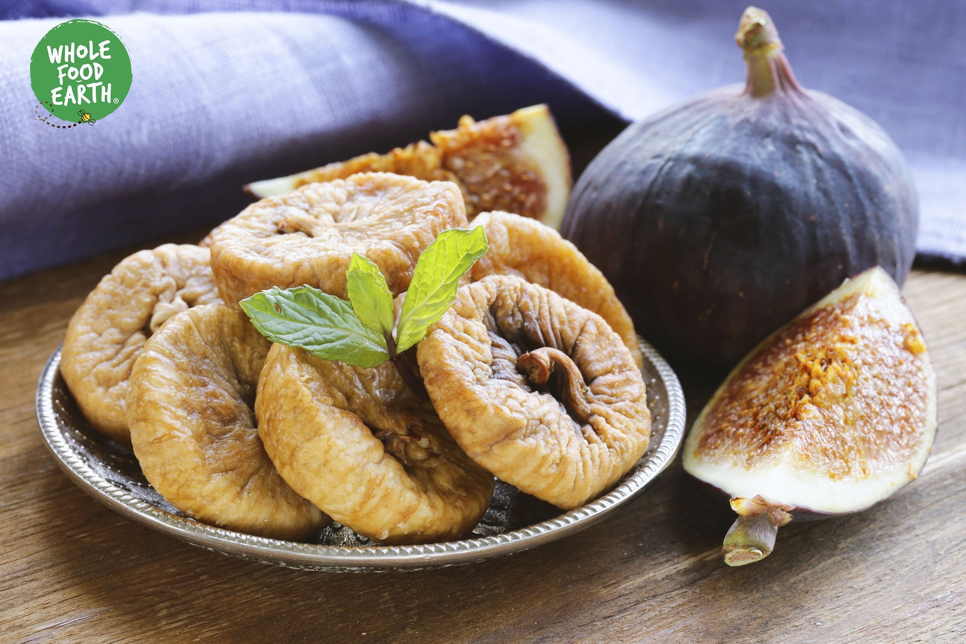 Natural dried figs from Whole Food Earth, showcasing plump, chewy dried fruit with a rich, sweet appearance.