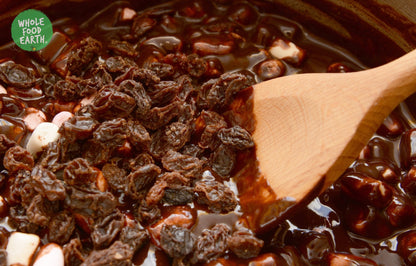 Dried mixed fruit without peel from Whole Food Earth, showcasing colorful, sliced dried fruits like apricots, dates, and figs.