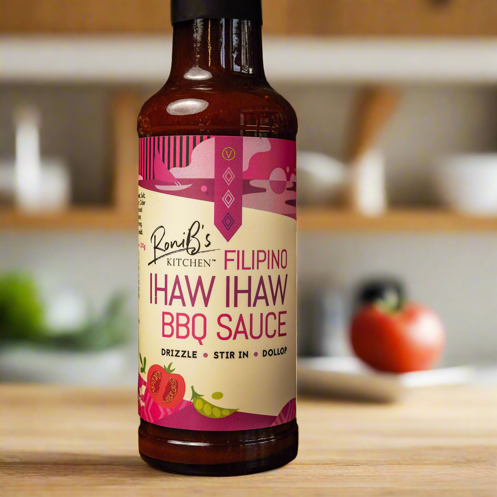 Filipino-style Ihaw Ihaw BBQ sauce by RoniBs Kitchen in a bottle, perfect for marinades and grilling, showcasing vibrant sauce and bottle.