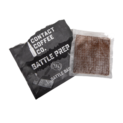 Single serve coffee brew bag from Contact Coffee Company Ltd. with coffee grounds inside, ready for brewing.