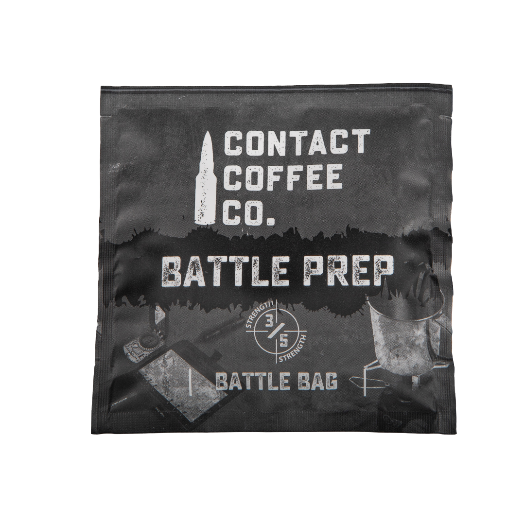 Single serve coffee brew bag from Contact Coffee Company Ltd. with coffee grounds visible inside, ready for brewing.