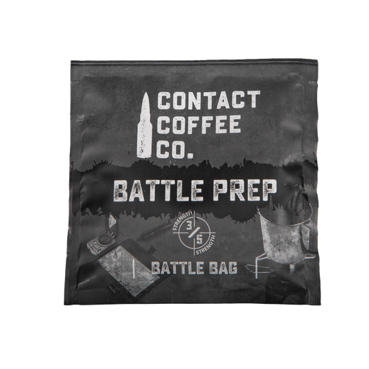 Single serve coffee brew bag from Contact Coffee Company Ltd. with coffee grounds visible inside, ready for brewing.