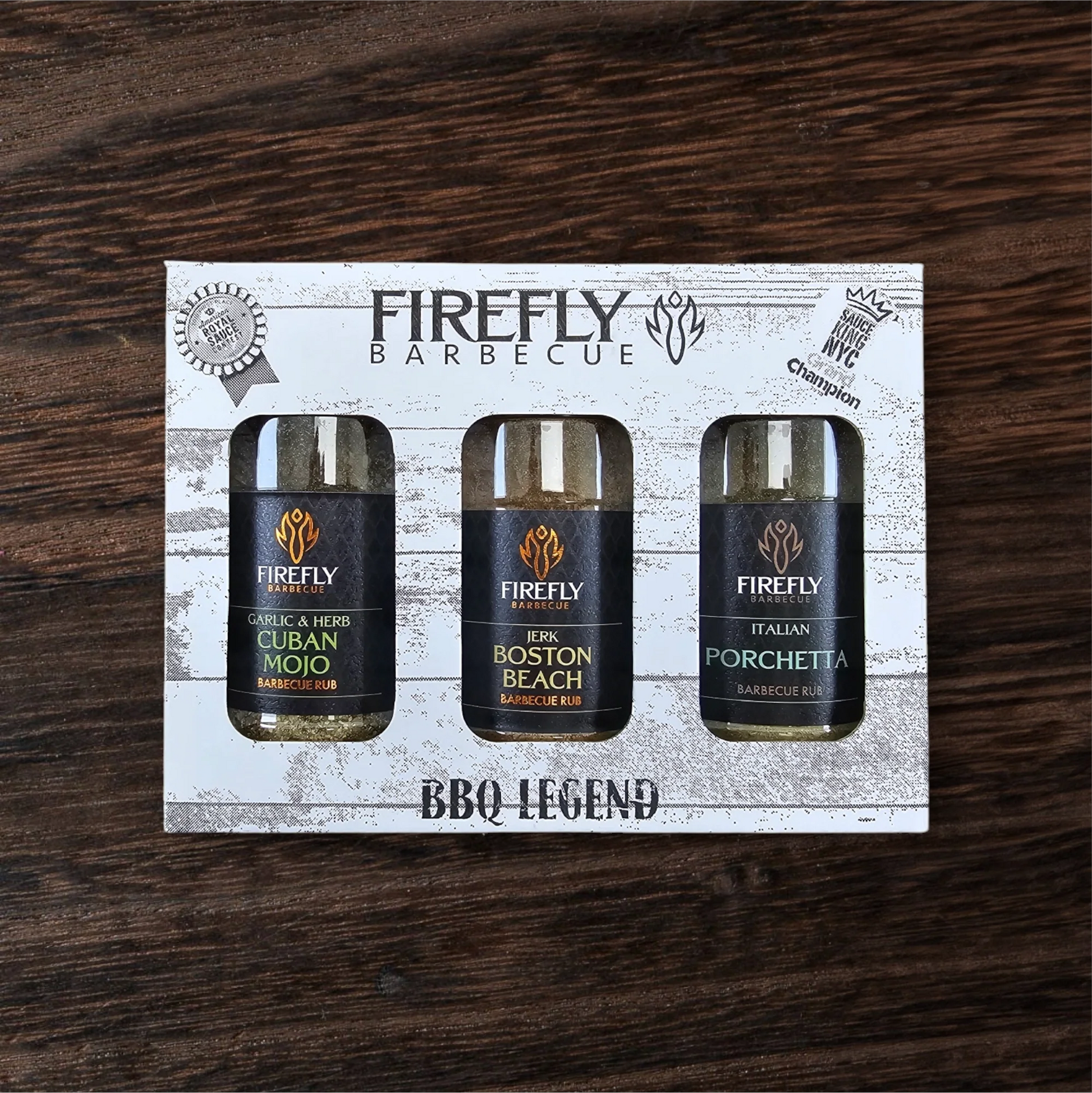 FireFly Barbecue's BBQ Legend 3 Herby BBQ Rubs gift pack featuring three bottles of flavorful herb-infused barbecue seasoning.