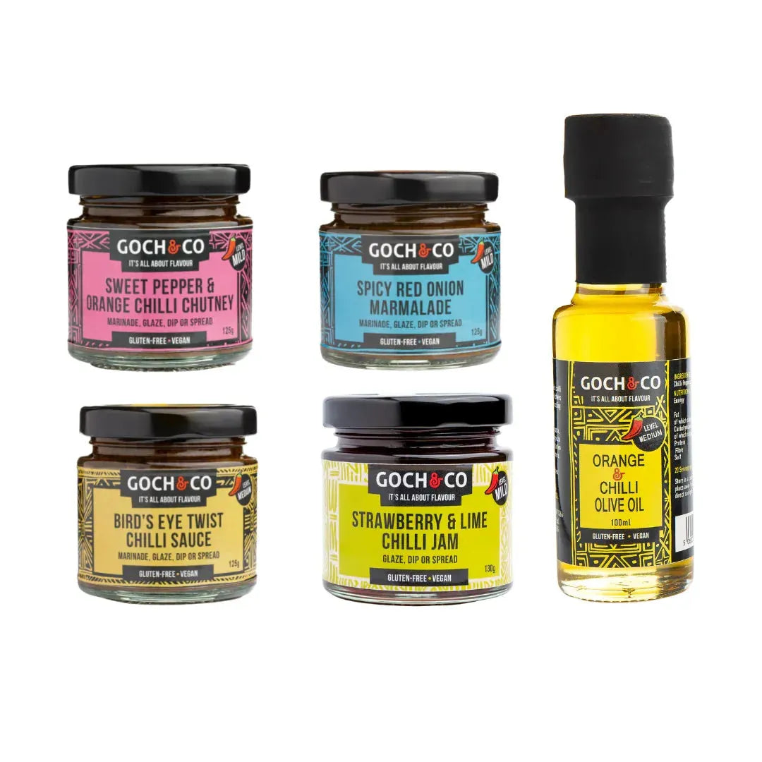 ArtisanBox BBQ sauces gift box with a variety of authentic flavor bottles on a white background for grilling and barbecue.