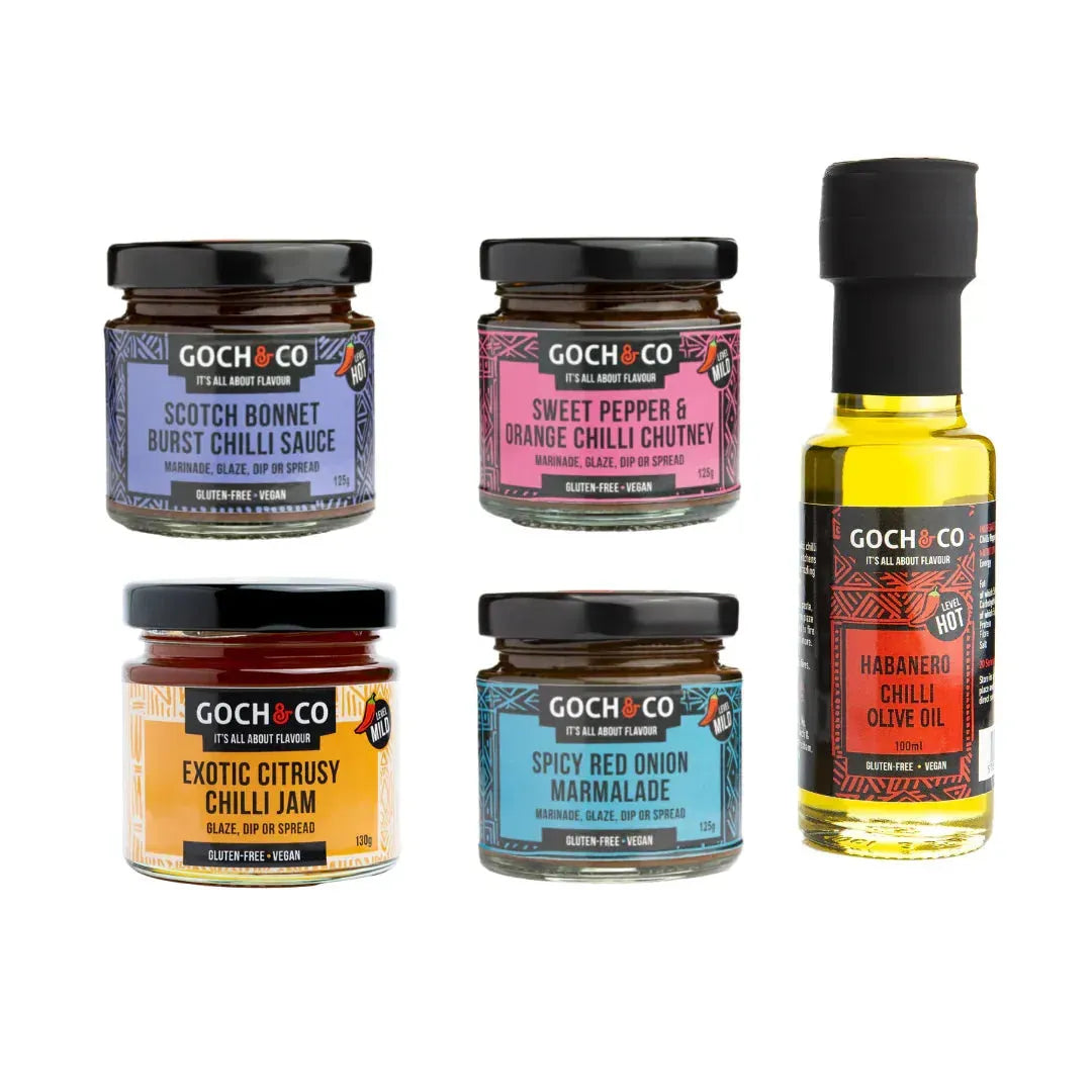 Assorted BBQ sauces gift box by ArtisanBox featuring various authentic-flavored sauces on a white background.