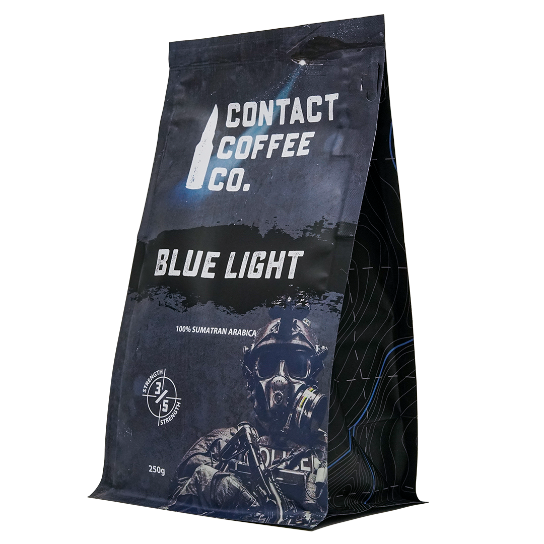 Blue Light Coffee from Contact Coffee Company Ltd., a fresh brewed coffee in a mug with a blue light background.