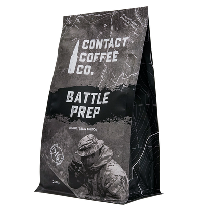 Contact Coffee Company Ltd. Battle Prep Coffee in a bag, showcasing a rich roasted coffee bean blend in a vibrant package.