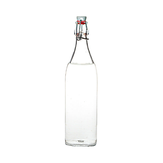 Clear glass Bormioli Rocco 1-liter round swing top bottle with metal clasp and rubber gasket for fresh storage.
