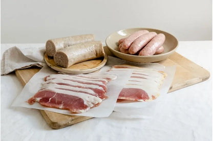 Family Breakfast Box from Primrose Herd featuring assorted meat cuts for a hearty breakfast meal.