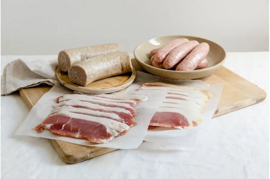 Family Breakfast Box from Primrose Herd featuring assorted meat cuts for a hearty breakfast meal.