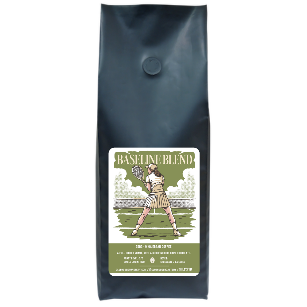 Bag of Clubhouse Roastery Baseline Blend coffee in 500g package, showing the label with branding and coffee beans.
