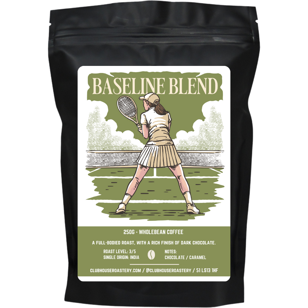 Bag of Clubhouse Roastery Baseline Blend coffee, showcasing a dark roasted coffee beans bag with branding and product label.