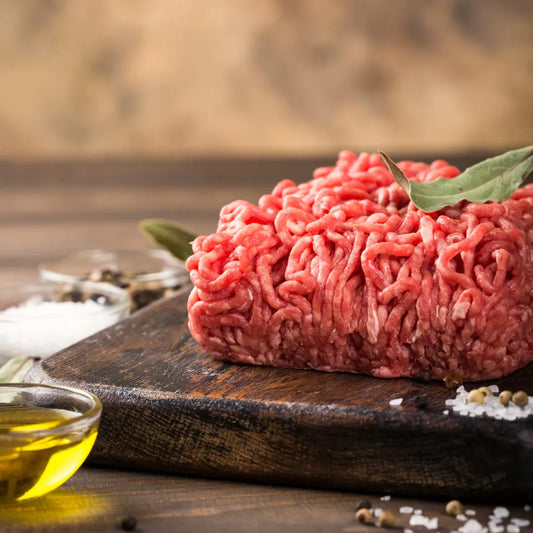 Fresh Primrose Herd beef mince in a 500g packaging, showing finely ground lean beef with a bright red color and natural marbling.
