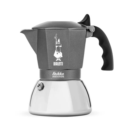 Bialetti Brikka induction stovetop coffee maker with stainless steel body and black handle, designed for rich espresso brewing.
