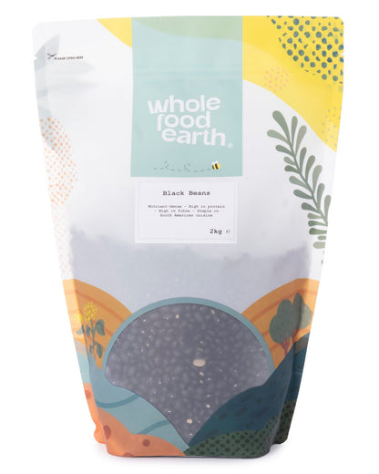 Two kilograms of Whole Food Earth black beans from the beans and pulses category, shown in a clear, close-up image.