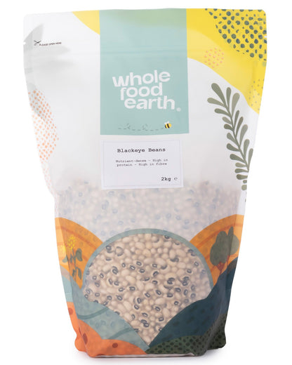 Two kilograms of Whole Food Earth blackeye beans, a type of beans and pulses, shown in a clear plastic bag.