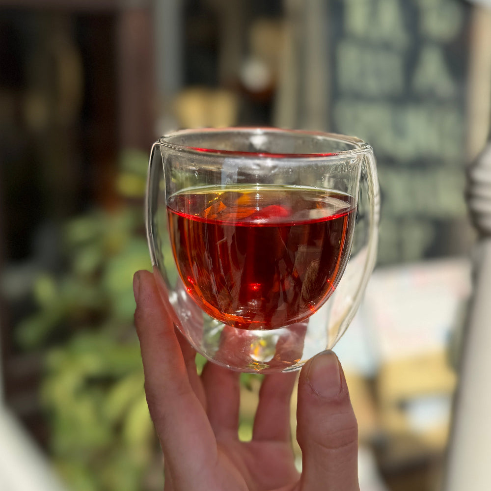 Loose leaf Black Tea with blueberry and maple flavors from Porter Hill Tea Company, showcasing vibrant blue and brown tea leaves.