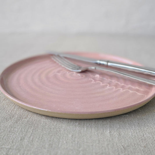 Blush pink classic lunch plate by Katie L Thompson Designs with matching cutlery on a white background.
