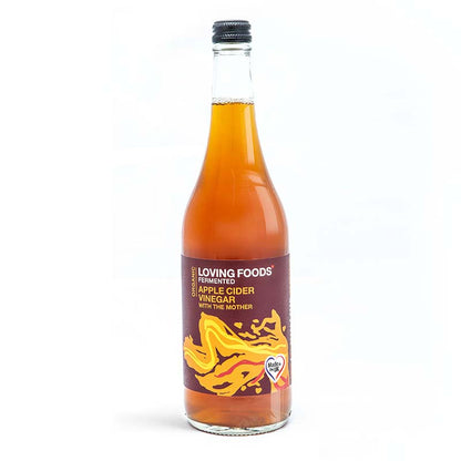 Loving Foods apple cider vinegar bottle with "The Mother" in a glass bottle on a white background.
