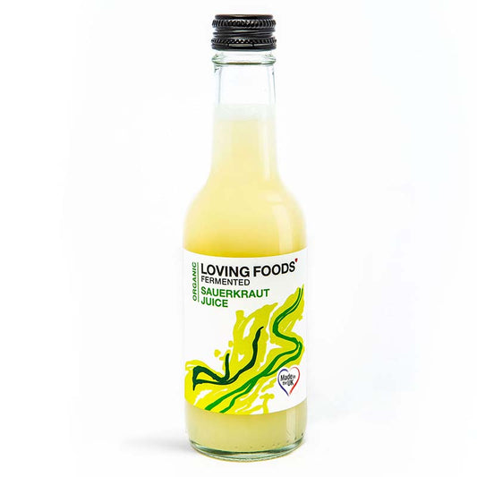 Bottle of Loving Foods organic fermented vegetable sauerkraut juice, showcasing clear glass with golden liquid inside.