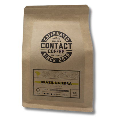 Single Origin Brazil Daterra coffee beans from Contact Coffee Company Ltd. displayed in a clear image of roasted beans.