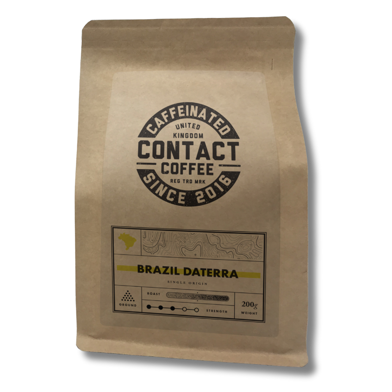 Ground Single Origin Brazil Daterra coffee from Contact Coffee Company Ltd., rich roasted beans ready for brewing.