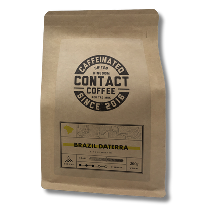 Ground Single Origin Brazil Daterra coffee from Contact Coffee Company Ltd., rich roasted beans ready for brewing.