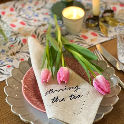 British Bees table runner by Avalon Home UK featuring a charming bees and honeycomb pattern on natural linen fabric.