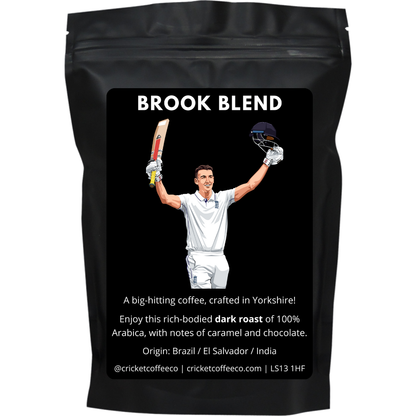 Bag of Clubhouse Roastery Brook Blend Dark Roast coffee with branding and product details on the packaging.