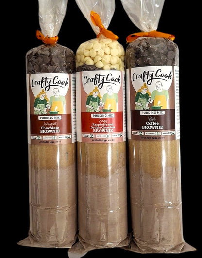Assorted sweet and savoury treats from Crafty Cook's Hamper10 bundle, including brownies and assorted snacks, displayed together.