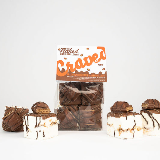 Milk Bueno Gourmet Marshmallows by THE MARSHMALLOW FACTORY, soft, creamy marshmallows with Bueno chocolate flavor on a white background.