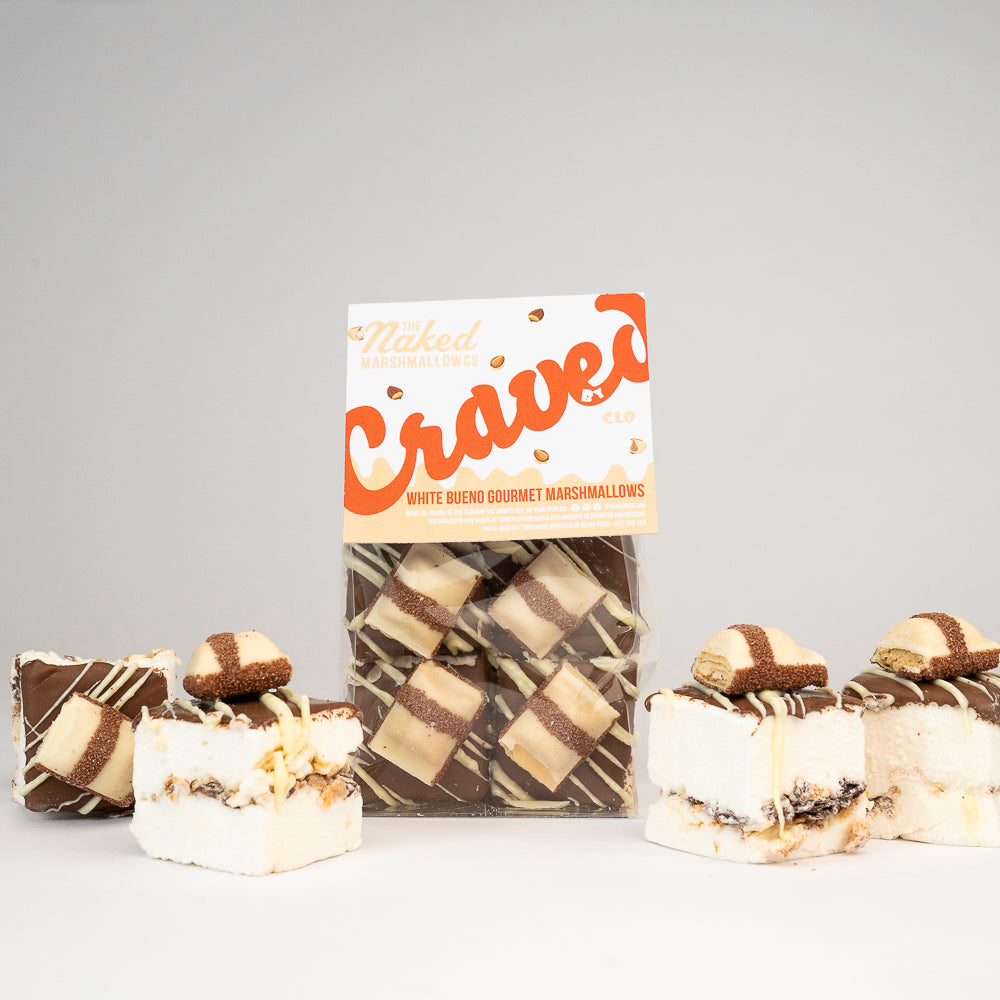 White Bueno Gourmet Marshmallows from THE MARSHMALLOW FACTORY displayed in a close-up shot with soft texture and fluffy appearance.