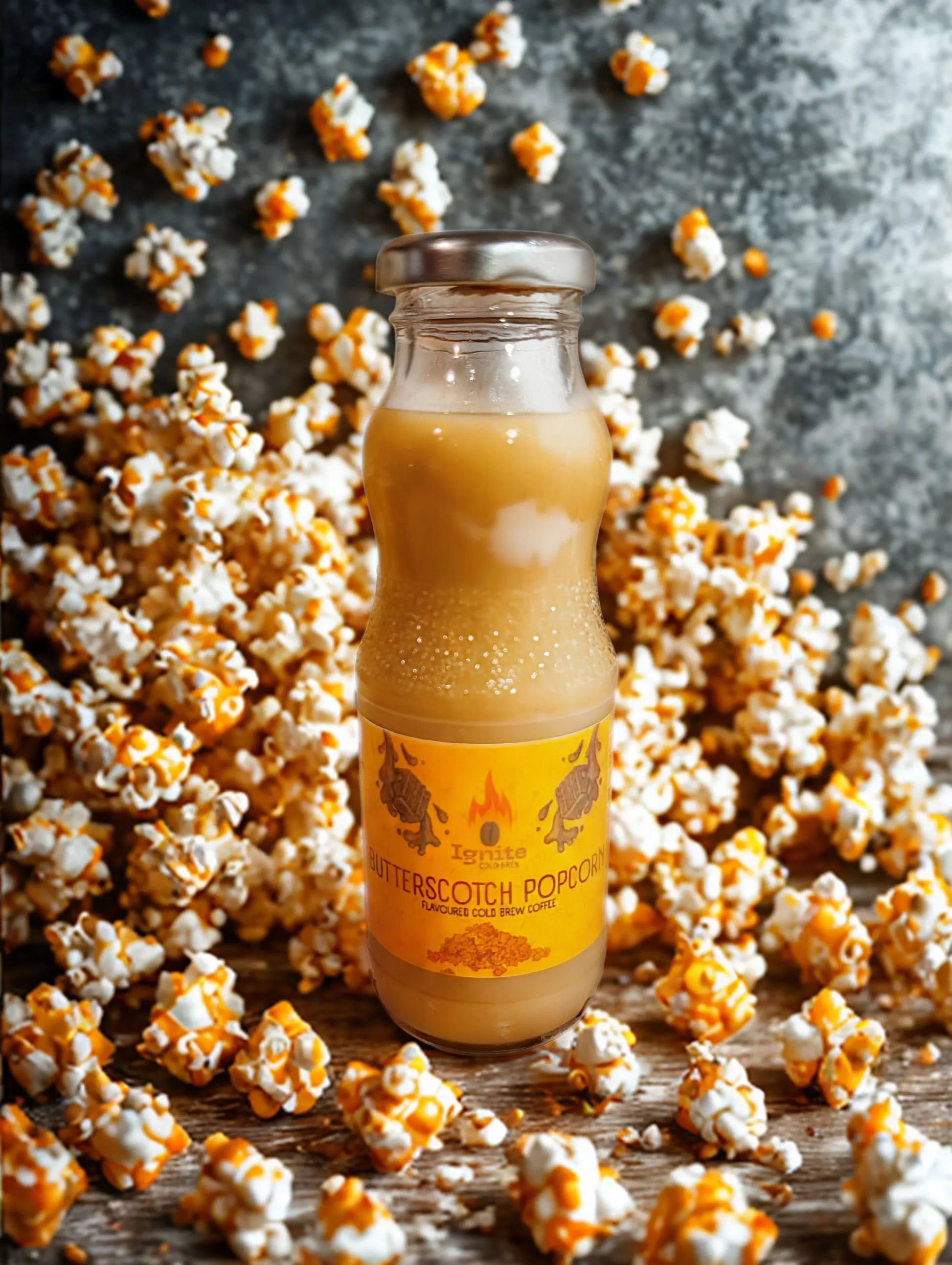 Cold brew pack with six popcorn-inspired flavors featuring butterscotch popcorn by Ignite Coffee Co for cozy sipping moments.