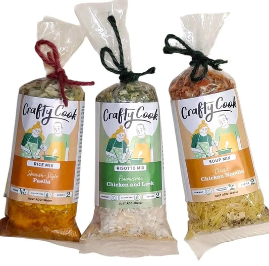 Crafty Cook Camper Cuisine Orange Collection mini van-shaped savory snacks in vibrant orange packaging, perfect for snacking on the go.