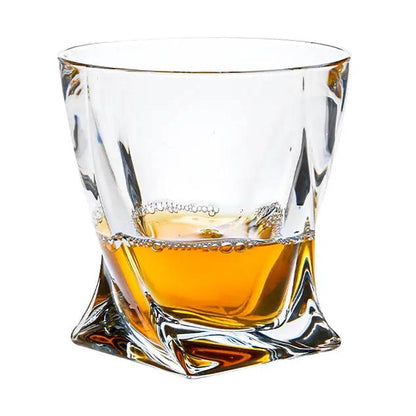 Crystalite 3-piece whisky decanter set by Glassware UK with a 0.85L glass decanters and matching glasses on a wooden surface.