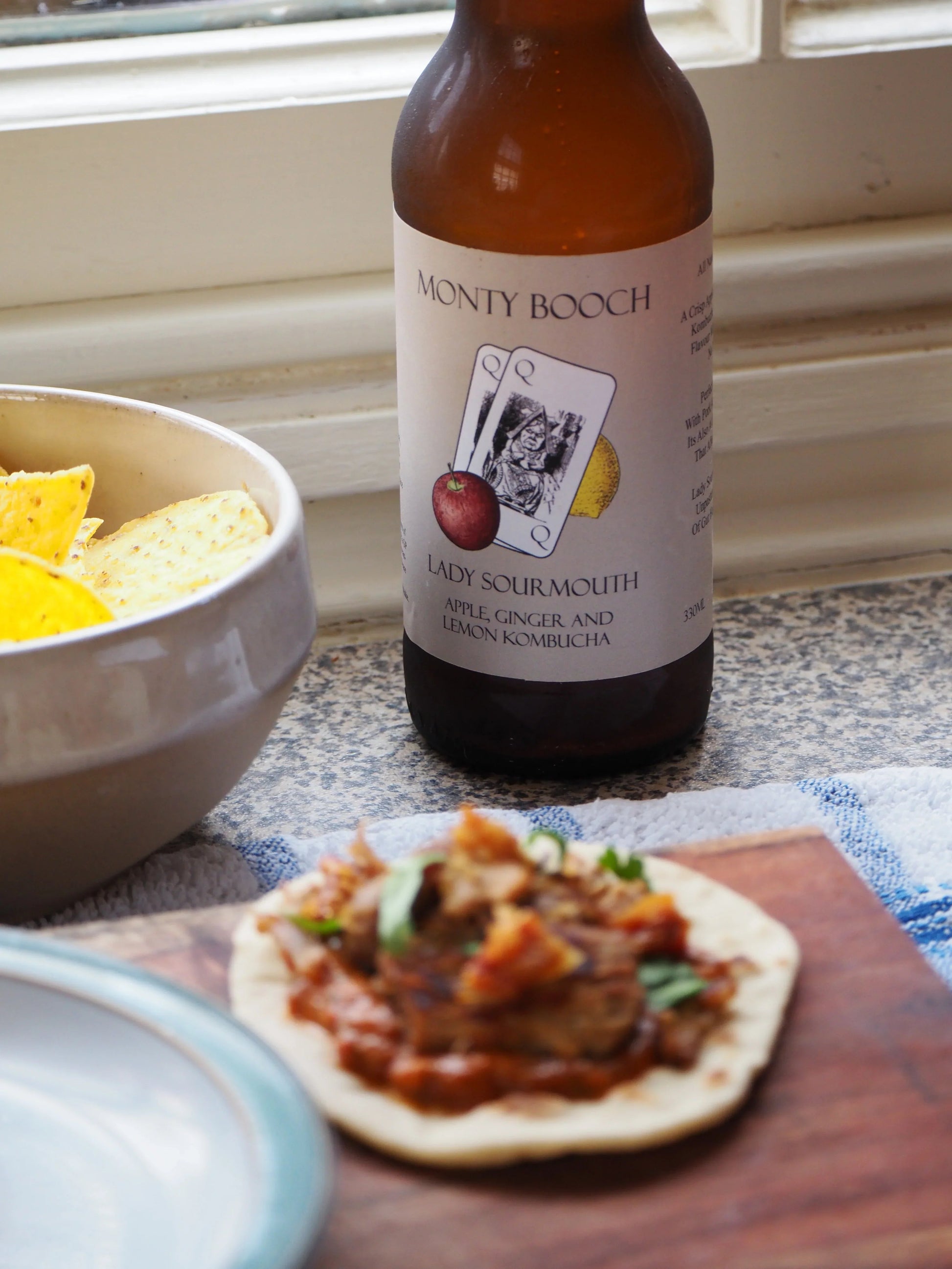 Lady Sourmouth Kombucha by Monty Booch featuring apple, ginger, lemon in a 330ml bottle, raw and unfiltered.