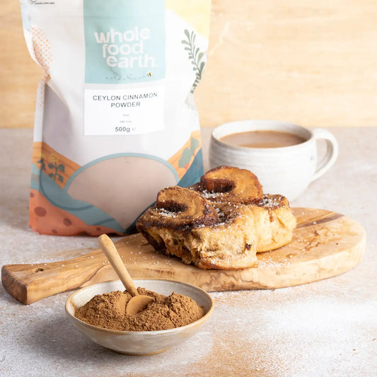 Ceylon cinnamon powder from Whole Food Earth, showcasing a jar of true Ceylon cinnamon spice on a wooden surface.