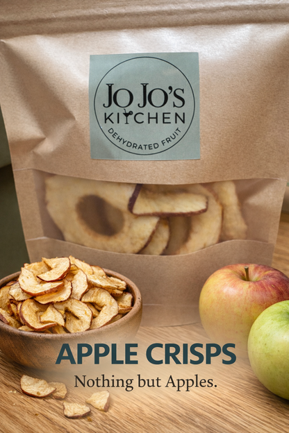 Crunchy apple crisps from JoJo’s Kitchen, golden-brown baked apple slices with a crispy texture, perfect for snacking or dessert.