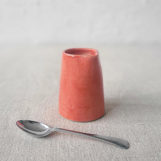 Cherry red mini jug by Katie L Thompson Designs with a classic shape and smooth finish, perfect for decorative or functional use.