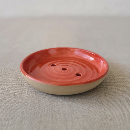 Cherry red ceramic soap dish from Katie L Thompson Designs with a classic rectangular shape and rounded edges.