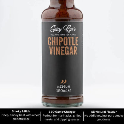 Bottle of Spicy Ryes Chipotle Vinegar with dark amber liquid and label featuring a chipotle pepper illustration.