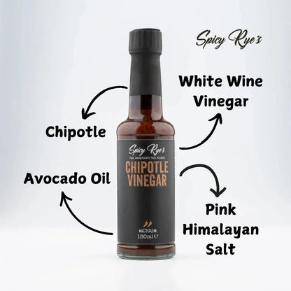 Bottle of Spicy Ryes Chipotle Vinegar with a dark amber liquid and label featuring chili peppers and smoky flavor hints.