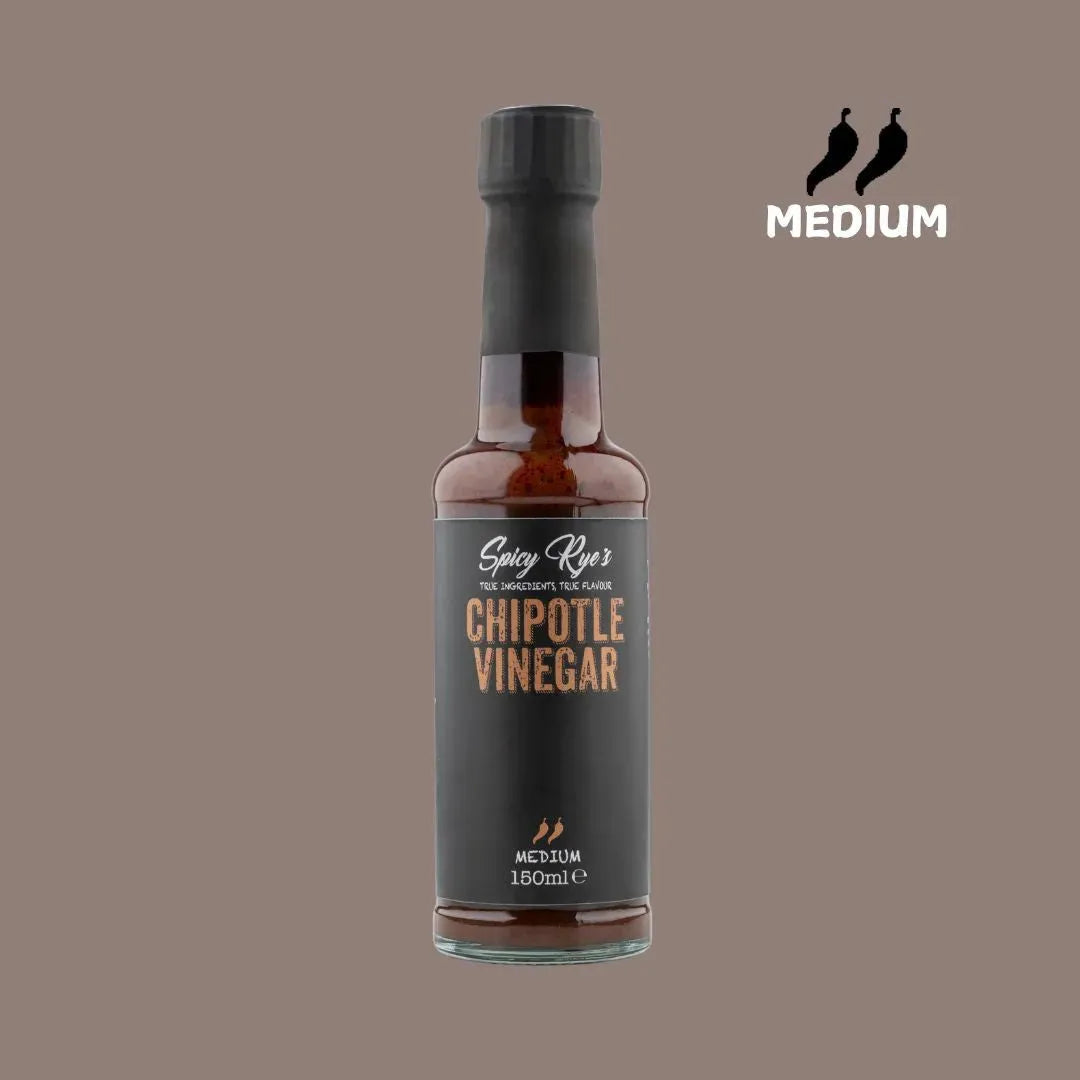 Spicy Ryes Chipotle Vinegar bottle with label, showcasing rich reddish-brown liquid and spicy chipotle flavor branding.