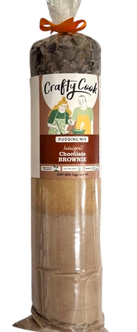 Gluten-free chocolate brownie mix by Crafty Cook, showing a package of rich, chocolate brownie batter mix on a kitchen counter.