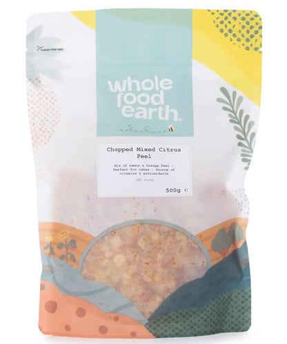 Dried chopped mixed citrus peel by Whole Food Earth, showing vibrant orange and yellow citrus peels in a bowl, ready for baking or snacking.