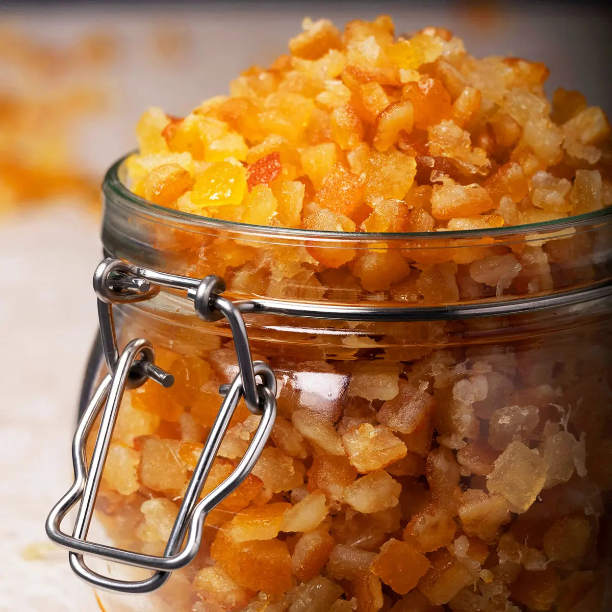 Dried chopped mixed citrus peel from Whole Food Earth, showing vibrant orange and yellow citrus pieces in a square image.