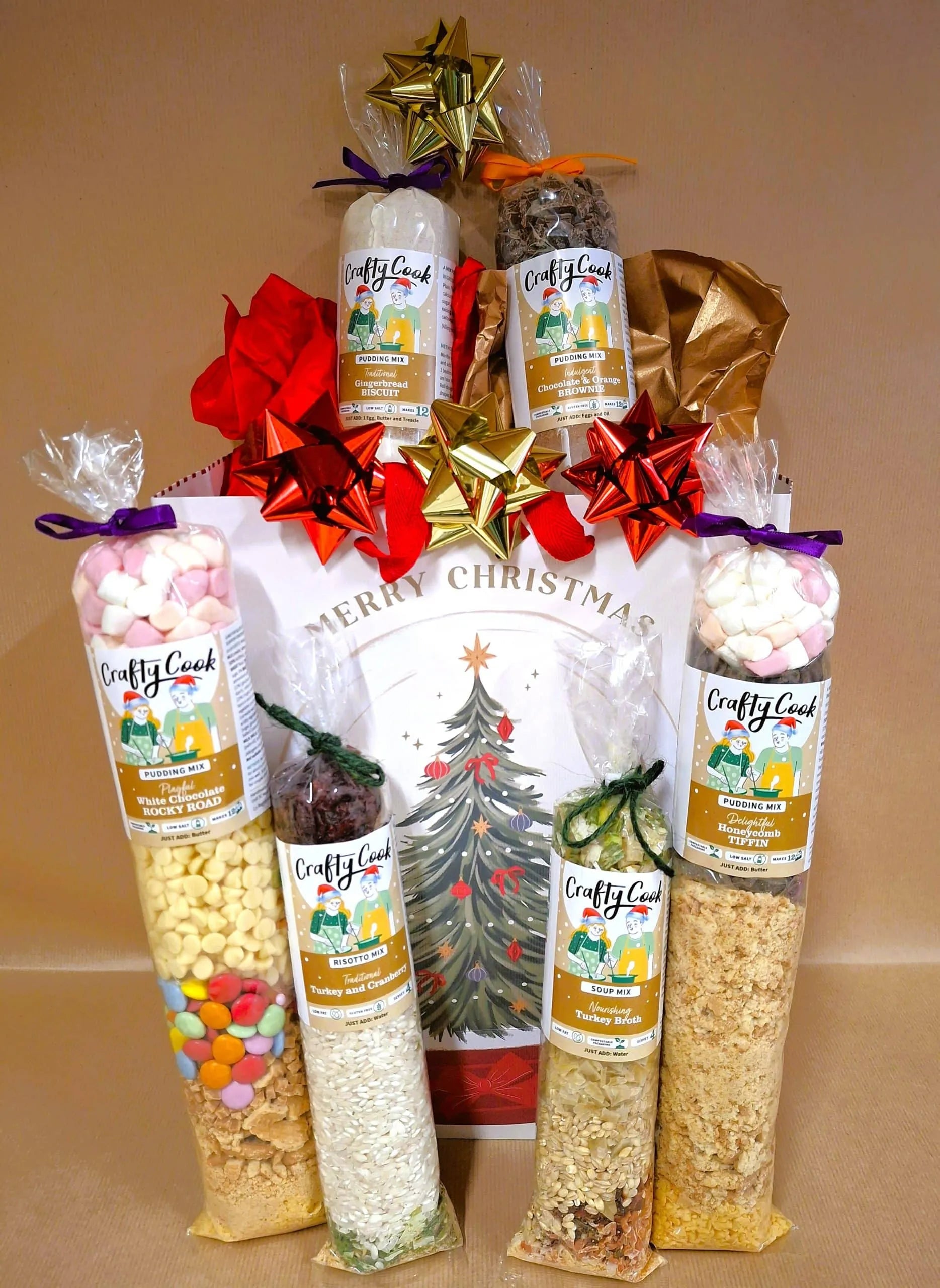 Crafty Cook Christmas hamper bundle featuring savory and sweet treats for holiday gift-giving, shown in a festive presentation.
